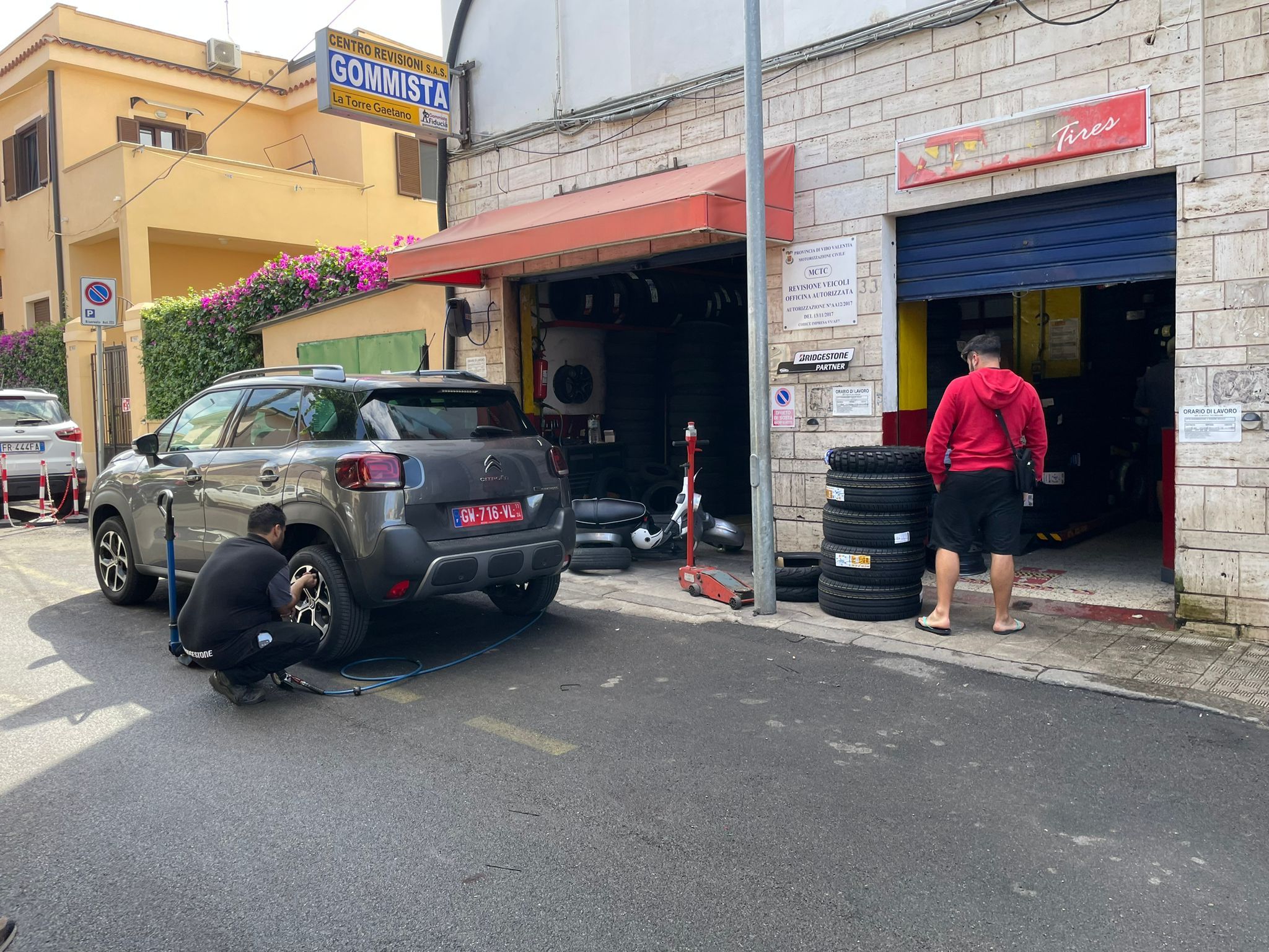 Flat tyre being replaced