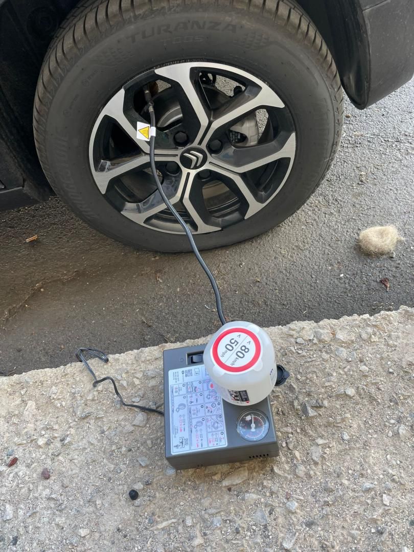 Flat tyre and compressor